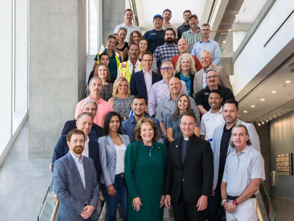 team of employees in an office building together